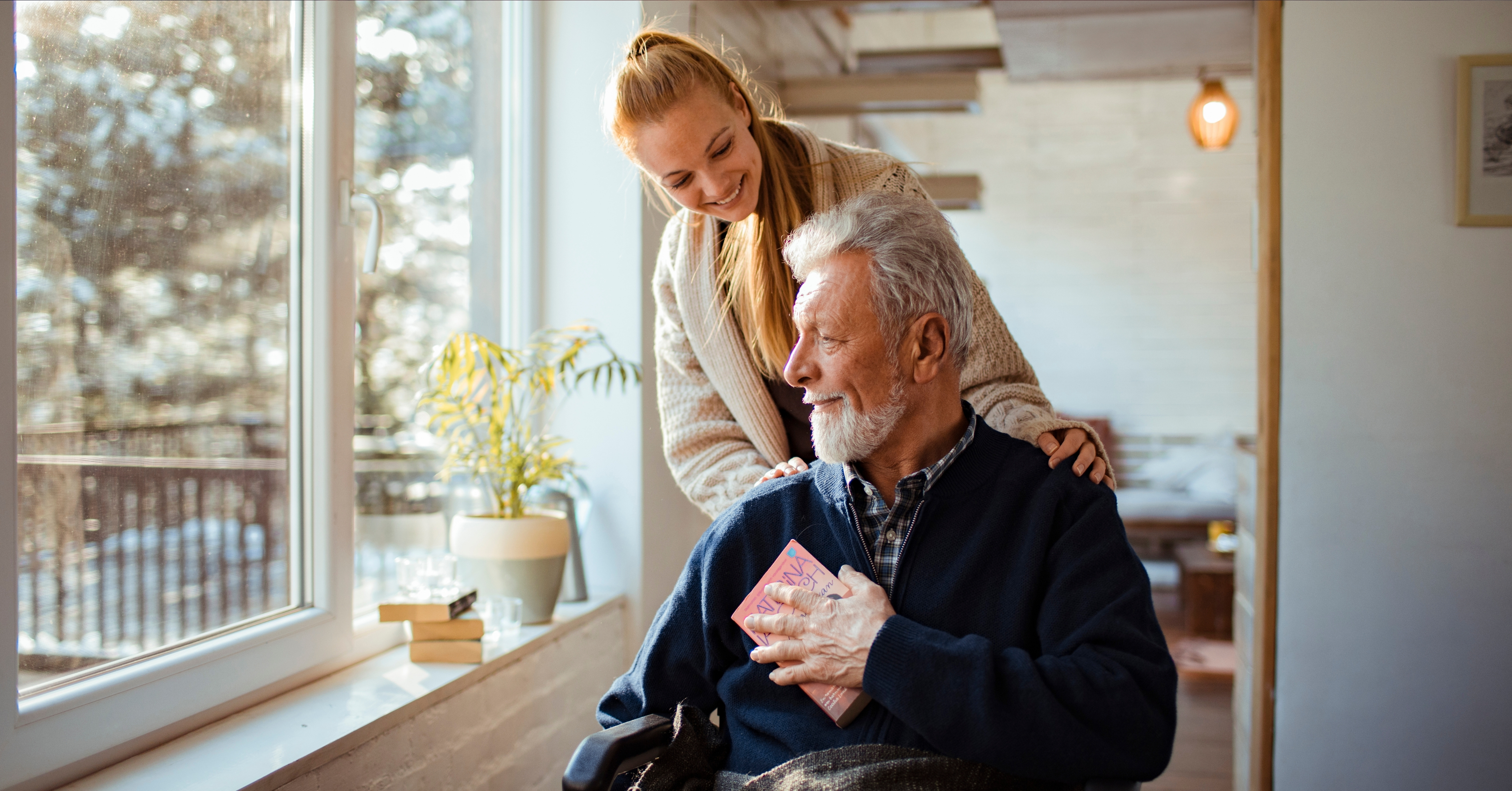 lady talking to man in wheelchair
