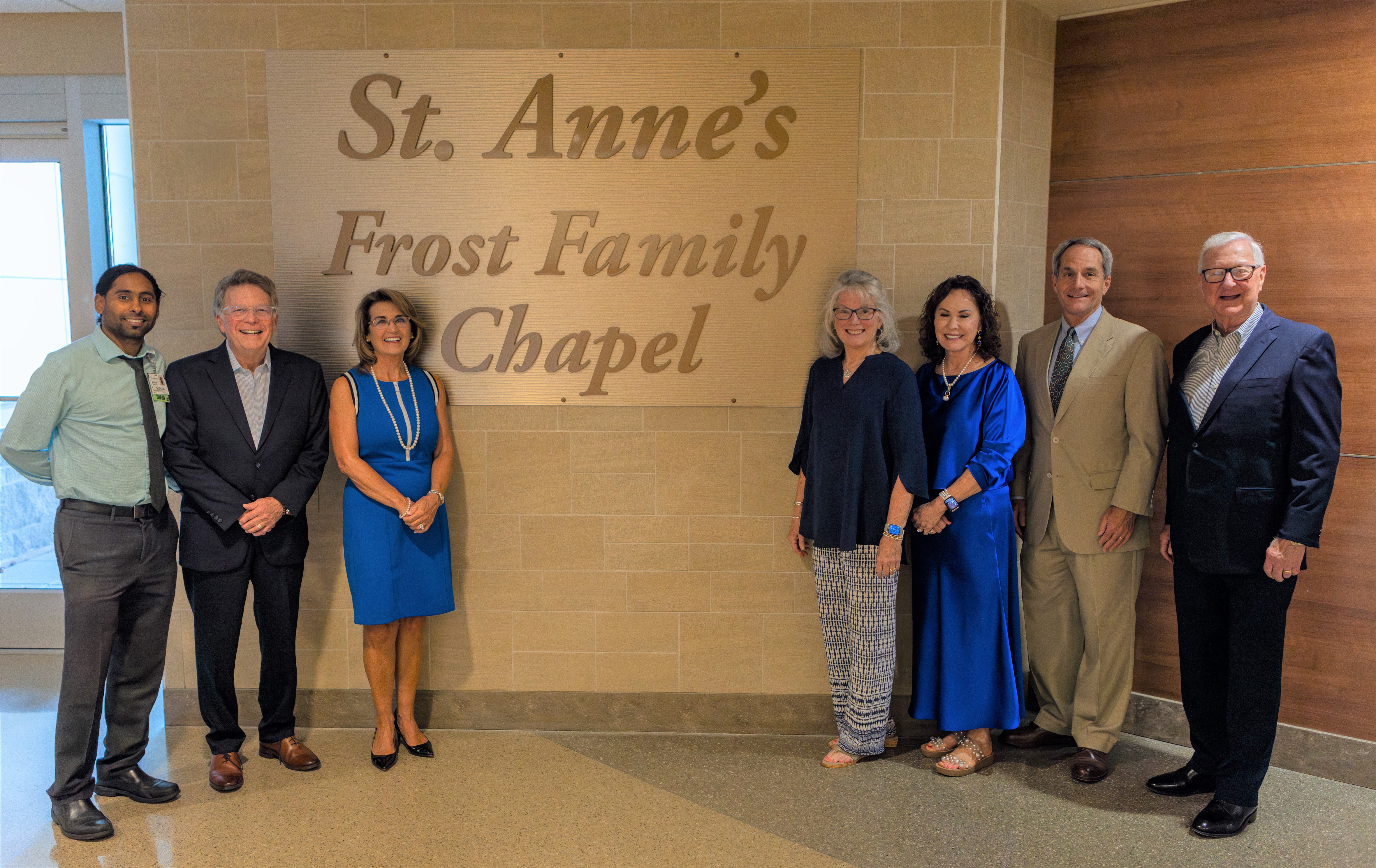 Members of the Frost Family standing in front of St. Anne's Chapel